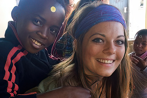 Child from study abroad location with IU student