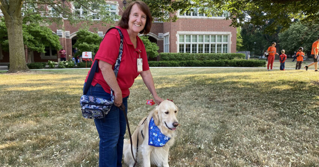 Jo Curtiss and her dog, Wrigley, provide comfort and support to patients through Riley's pet therapy program