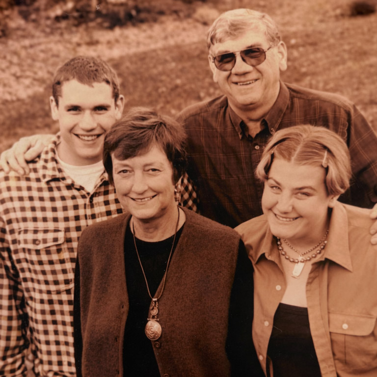Dr. Beverly Flynn poses with her family in this sepia-toned photo